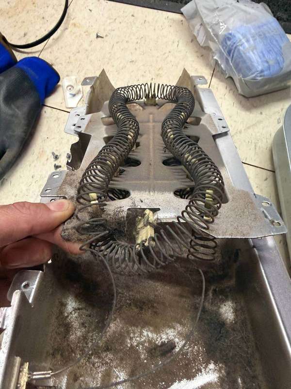 Failed dryer heating element removed during a no-heat repair — DFW