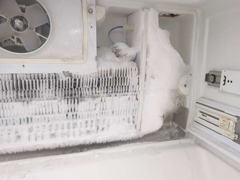 Freezer evaporator completely covered in frost from defrost system failure, Fort Worth TX
