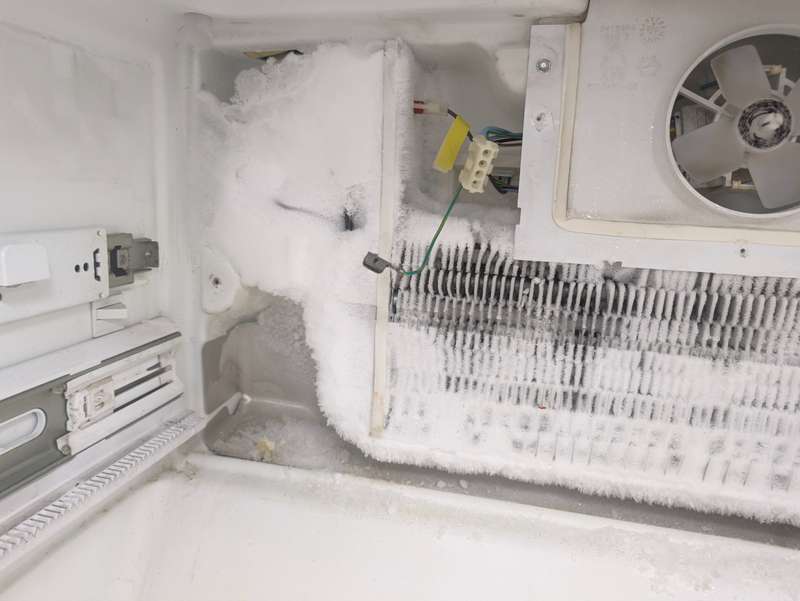 Freezer evaporator iced over from a failed defrost heater — Keller TX