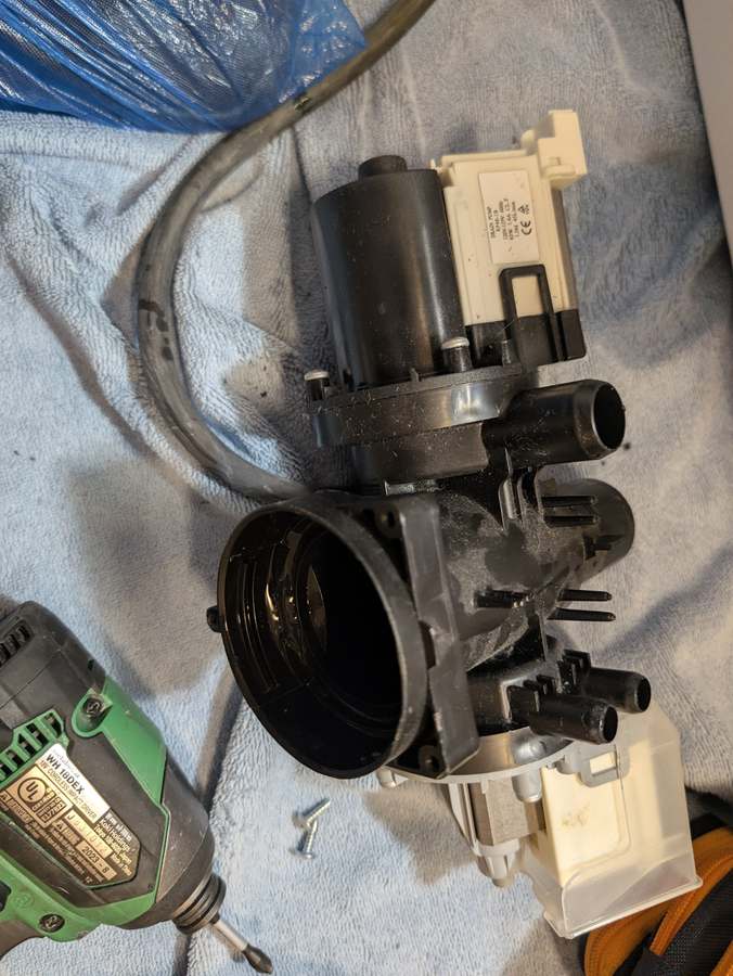 LG front-load washer drain pump assembly removed for replacement &mdash; Fort Worth TX