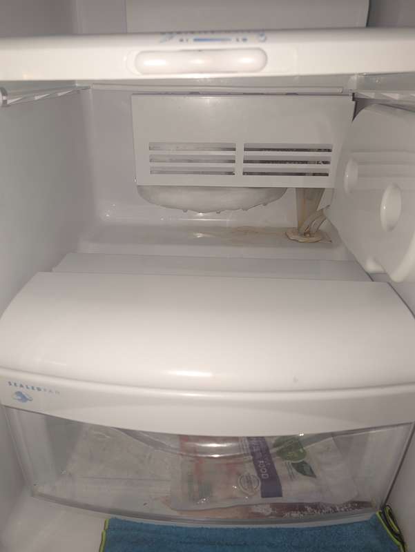 Ice buildup on refrigerator air duct and damper blocking airflow - Fort Worth TX