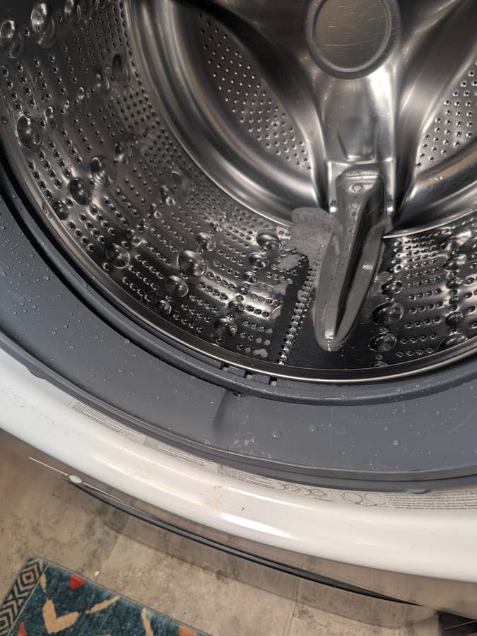 Front-load washer after door seal replacement, leak tested - Fort Worth TX