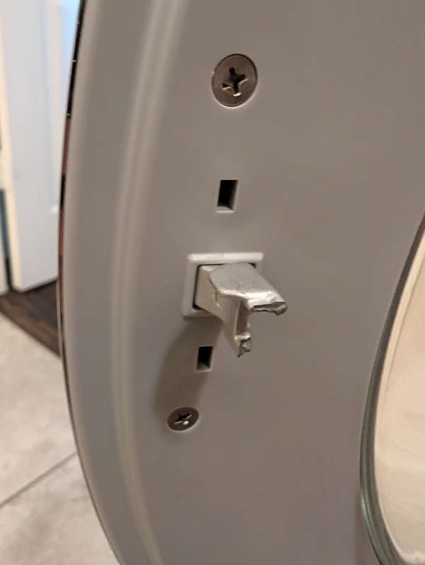 Broken front-load washer door strike causing door lock error - Fort Worth TX