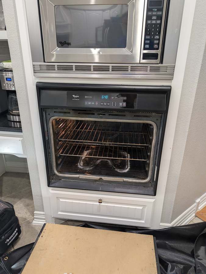 Whirlpool built-in wall oven with the door removed for bake element access &mdash; Fort Worth TX
