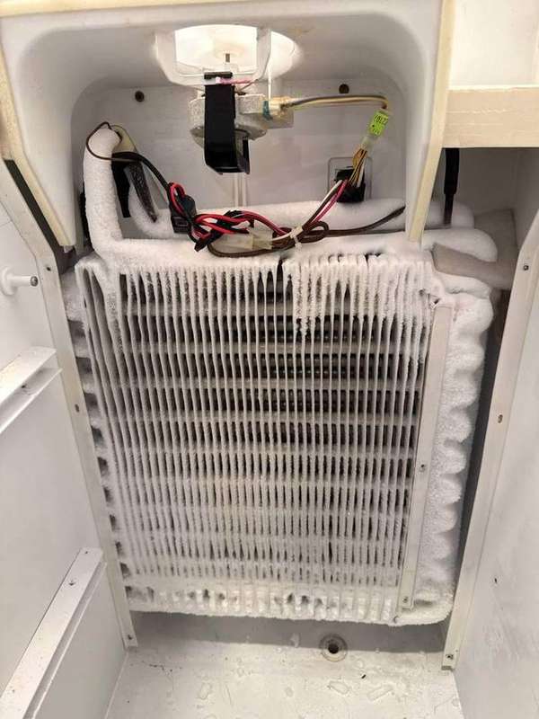 Frozen evaporator — defrost system failure